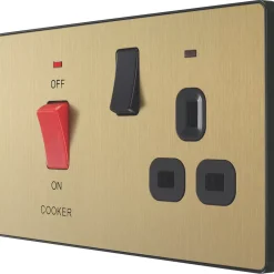 British General Evolve 45A 2-Gang 2-Pole Cooker Switch & 13A DP Switched Socket Satin Brass With LED With Black Inserts