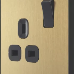 British General Evolve 13A 1-Gang SP Switched Socket Satin Brass With Black Inserts